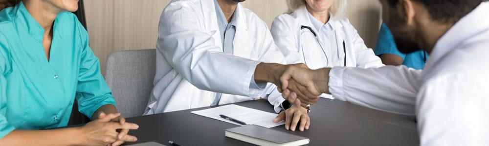 Doctors interviewing a candidate