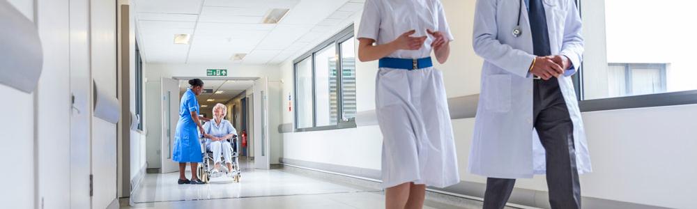 Doctors walking down hospital corridor