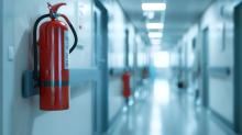 Fire extinguisher on a hospital corridor