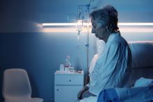 Old woman in hospital at night
