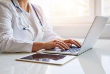 Doctor on computer