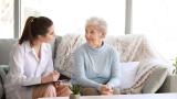 Doctor speaking to elderly woman