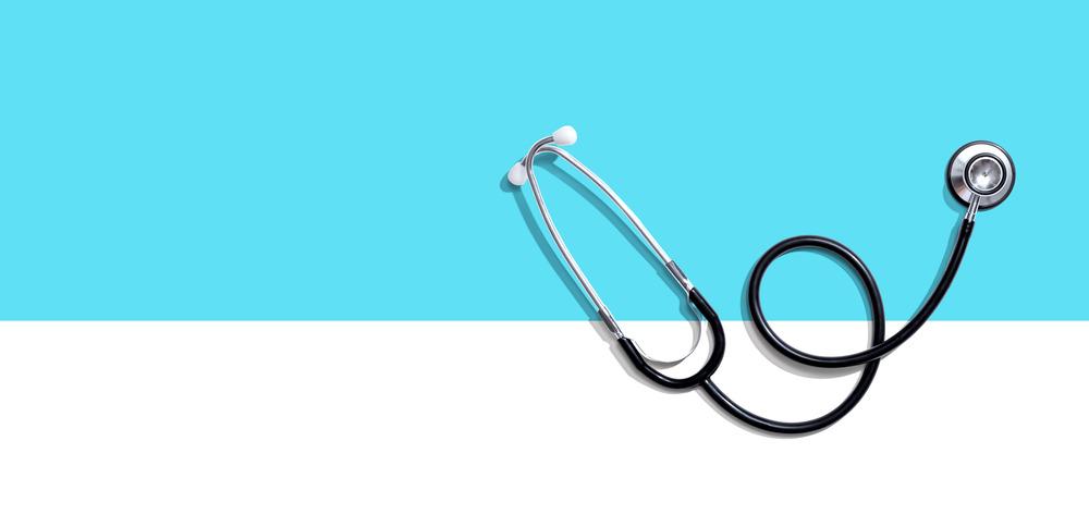 A stephoscope on a white and blue background.