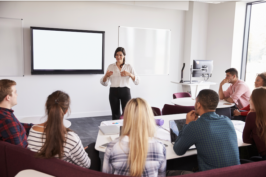 People in a classroom having a lesson.