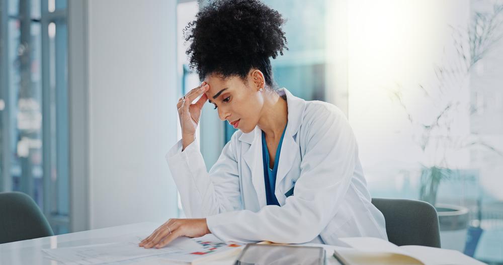 Doctor with a big headache.