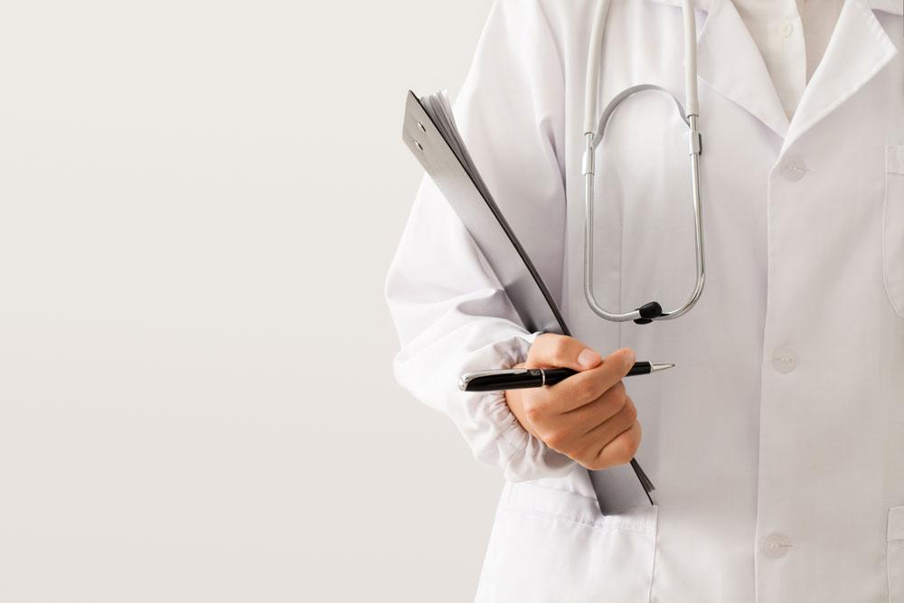 Doctor with clipboard.