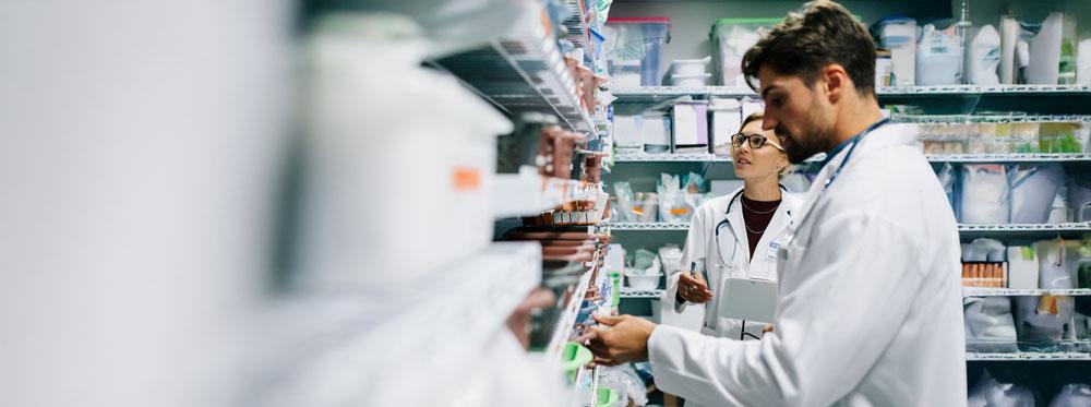 Healthcare professionals checking medicine stock