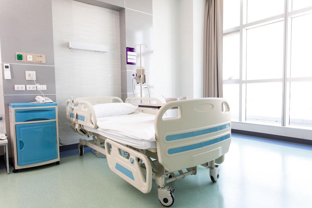 Clean empty hospital bed